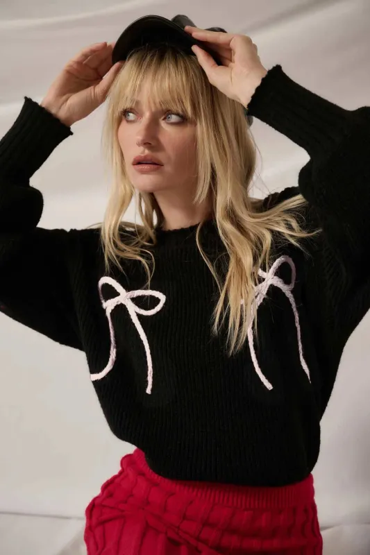 Tied and True Ribbed Knit Yarn Bow Sweater sold by Promesa