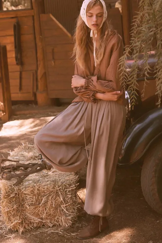 Loosely Translated Pleated Wide-Leg Harem Pants sold by Promesa