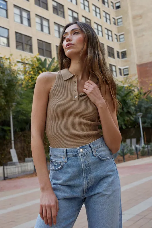 Shaper Fit Collared Rib-Knit Sleeveless Polo Top sold by Promesa