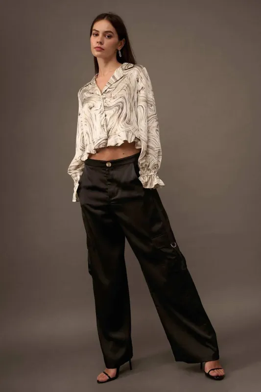 In the Pocket Matte Satin Cargo Pants sold by Promesa