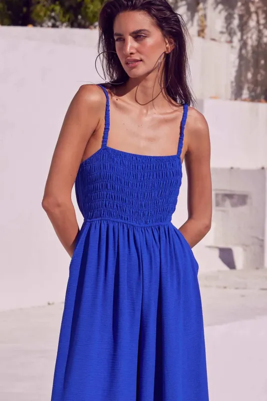 Catch Your Breath Smocked Crepe Wide-Leg Jumpsuit sold by Promesa