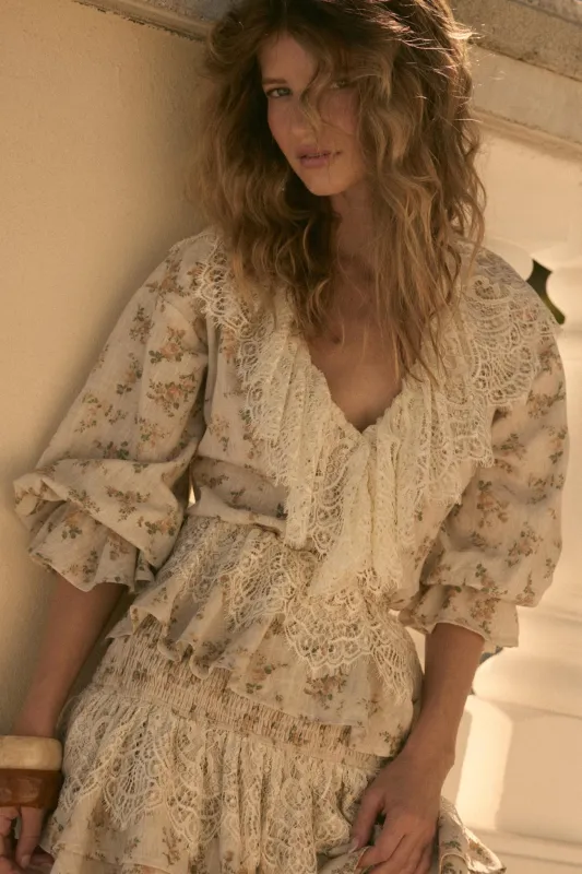 True Beauty Floral Puff-Sleeve Ruffle Peplum Top sold by Promesa