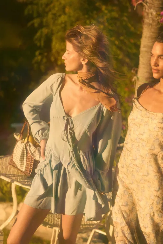 Bright Sky Ruffled Denim Tie-Front Romper sold by Promesa