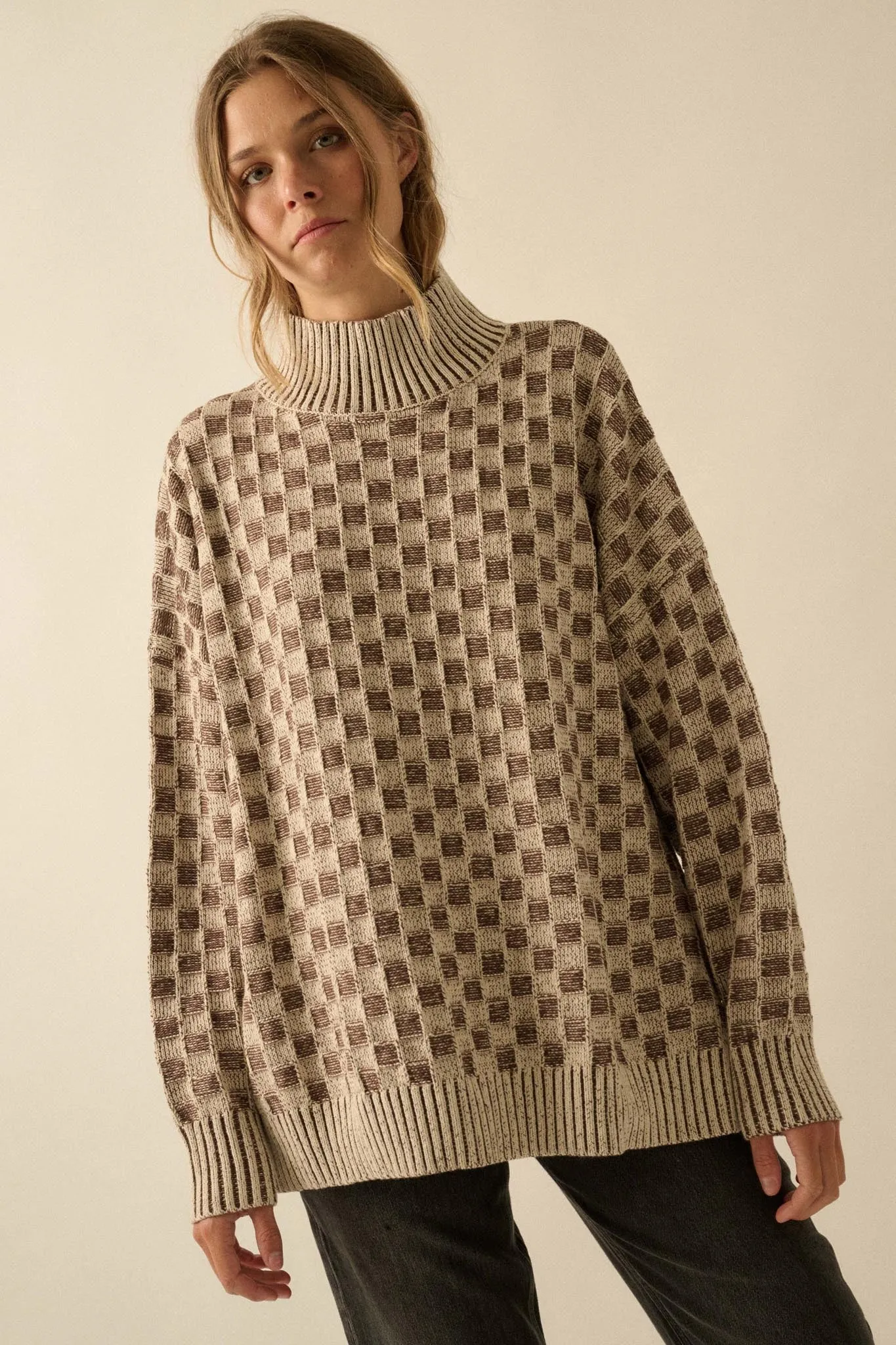 Checkmate Checkered Knit Mock-Neck Sweater sold by Promesa