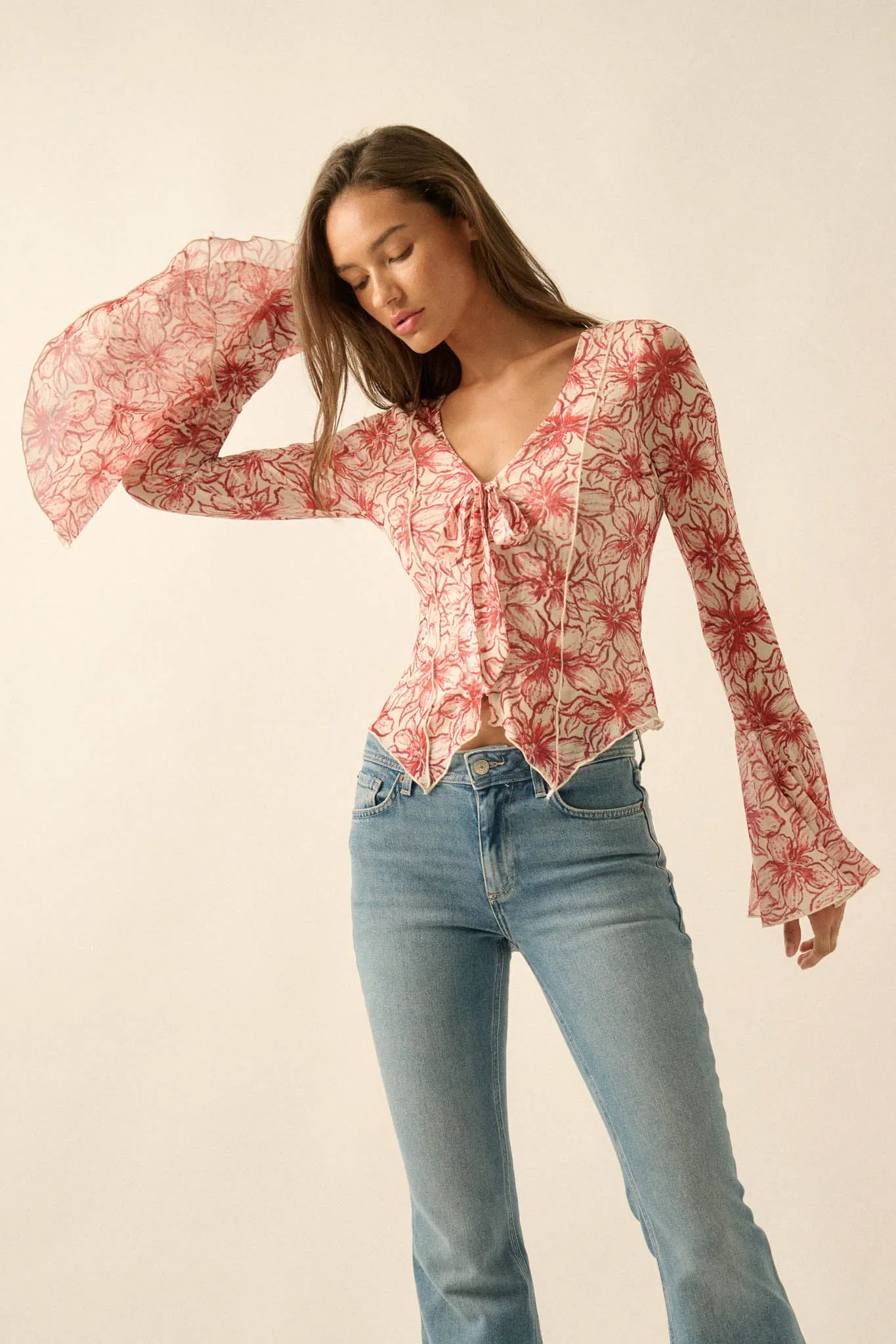 Wild Lilies Floral Mesh Tie-Front Bell-Sleeve Top sold by Promesa