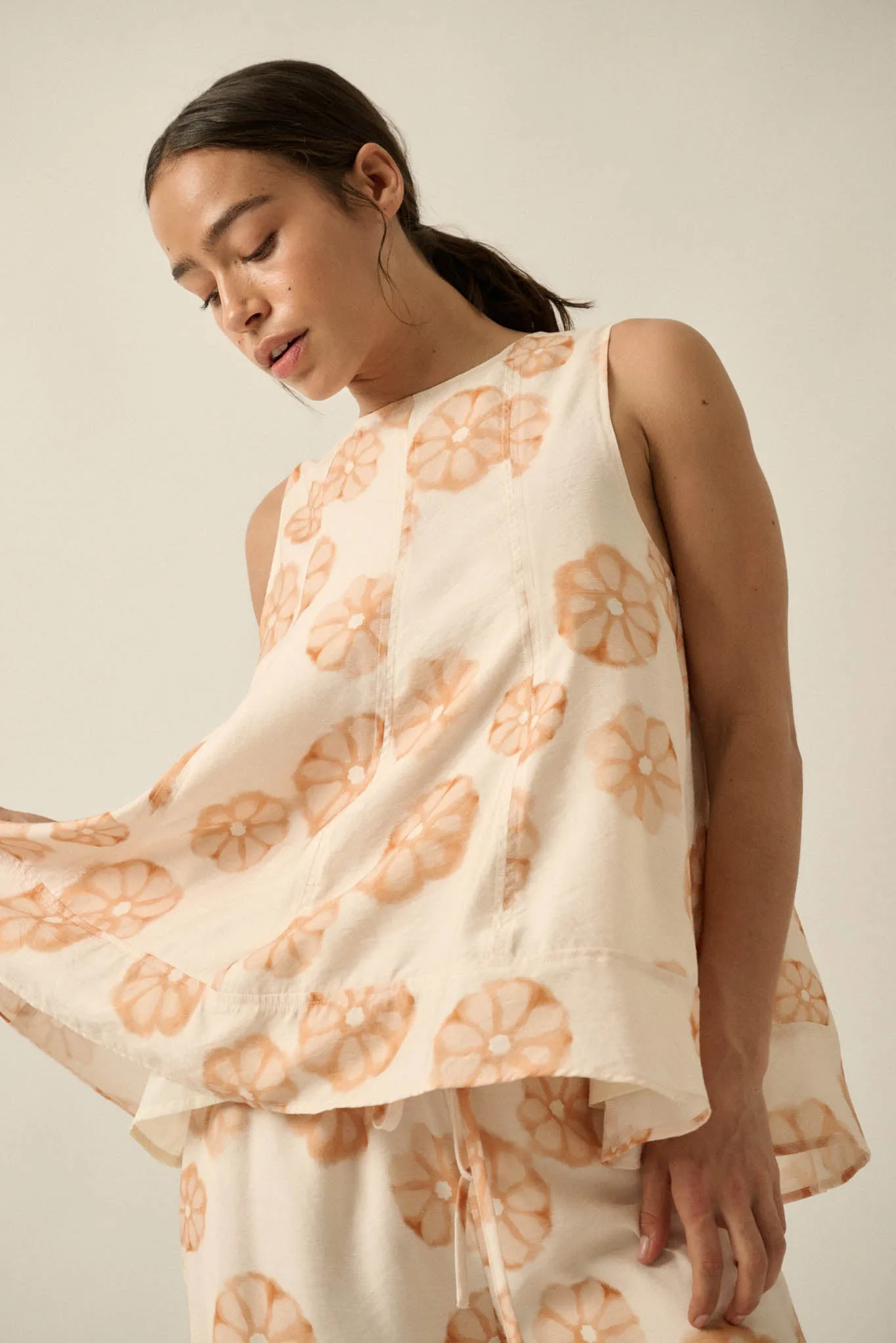 So Delightful Floral Sleeveless A-Line Swing Top sold by Promesa