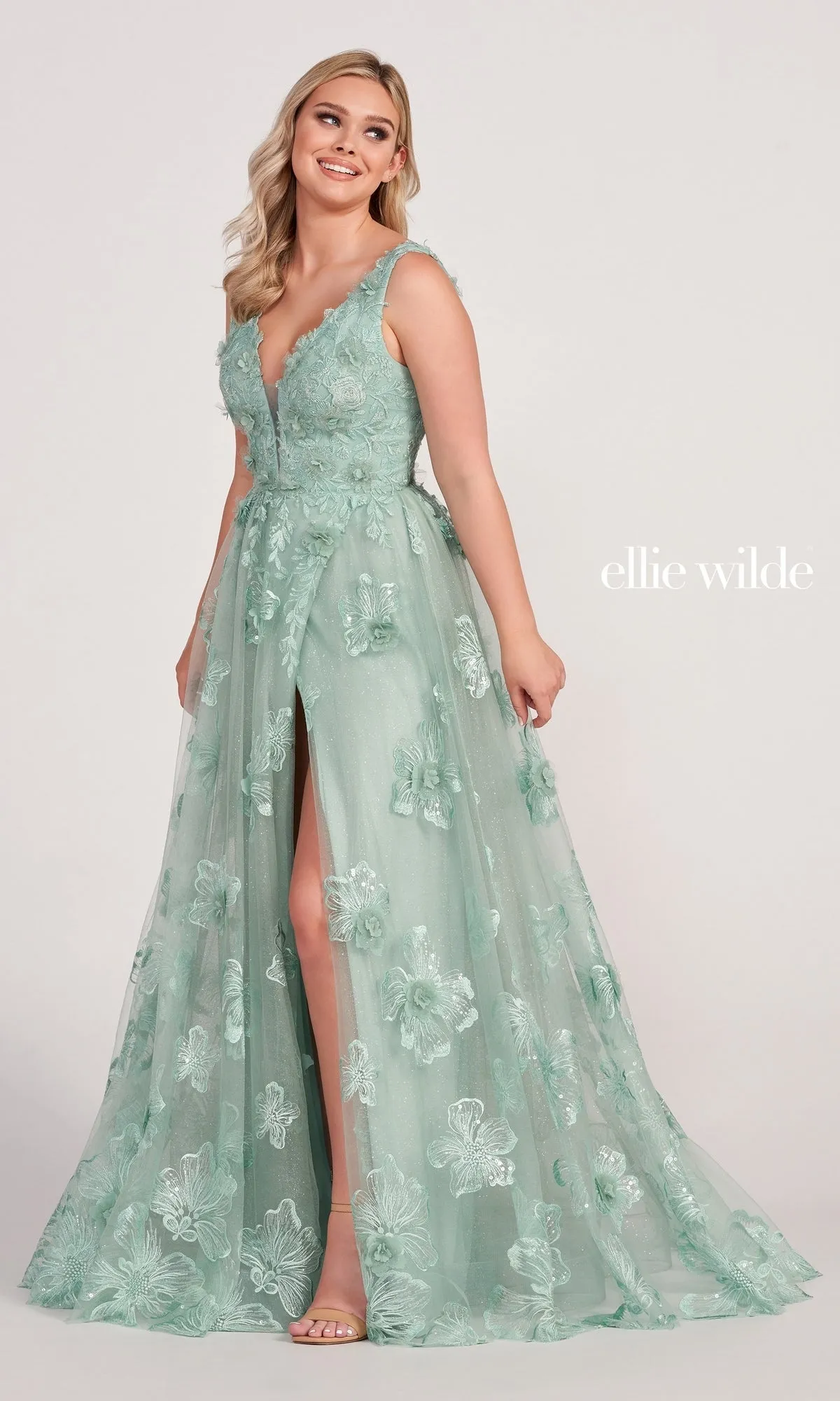 Ellie Wilde Faux-Wrap Embroidered-Lace Prom Dress sold by PromGirl