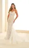 Long Lace Wedding Dress: Ellie Wilde EW36011 sold by PromGirl