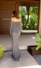 Caped Long Beaded Prom Dress: Primavera 13123 sold by PromGirl