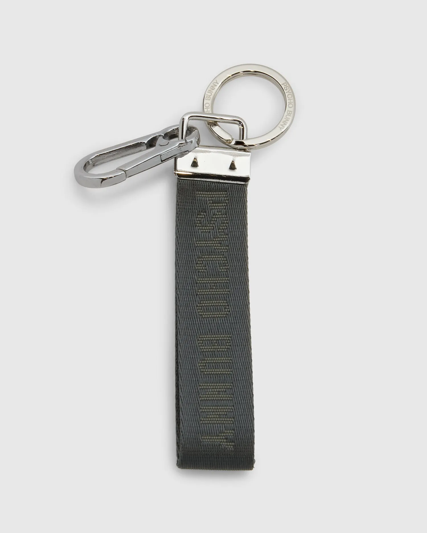 WOVEN TAB KEYCHAIN - B6A374E200 sold by Psycho Bunny