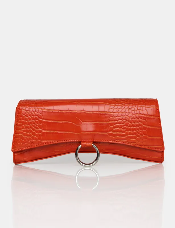 The Kemi Orange Arched Crossbody Mini Handbag made by Public Desire