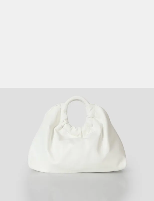 The Darcie White Round Grab Handle Oversized Clutch Bag sold by Public Desire