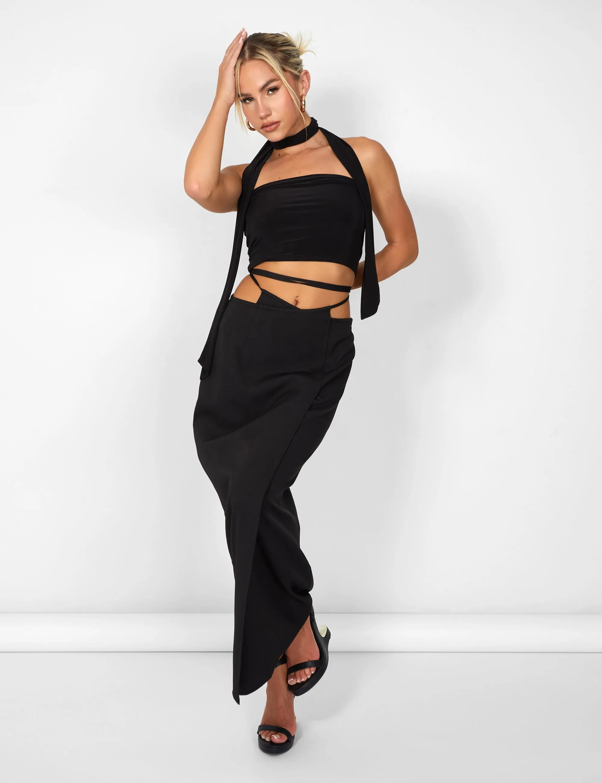 Kaiia Wrap Tie Side Maxi Skirt in Black sold by Public Desire