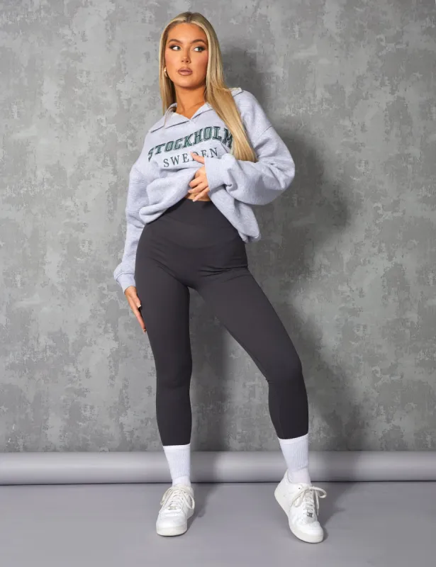 OVERSIZED STOCKHOLM SLOGAN RUGBY SWEATSHIRT GREY MARL sold by Public Desire