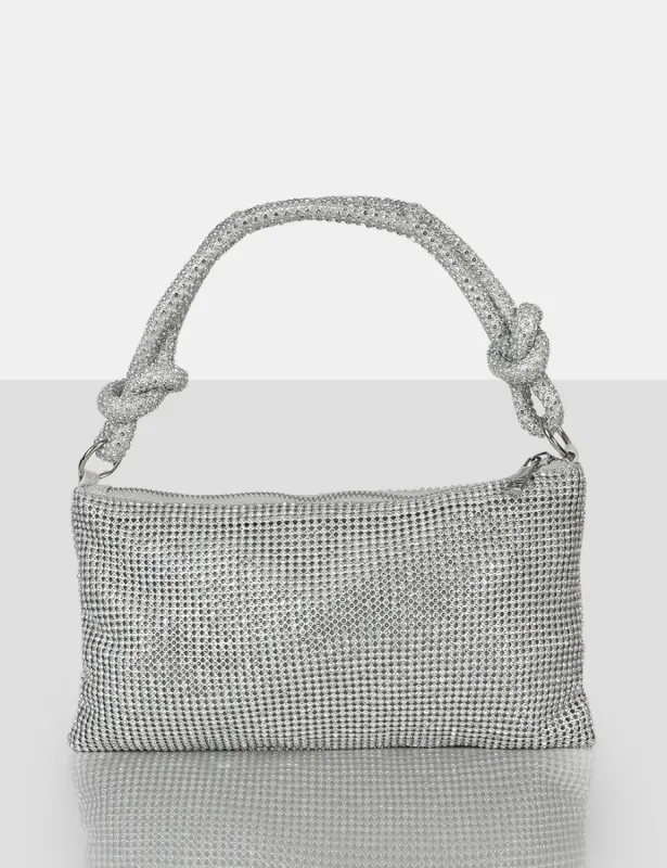 The Ingrid Silver Diamante Zip Up Knot Detail Mini Shoulder Bag sold by Public Desire