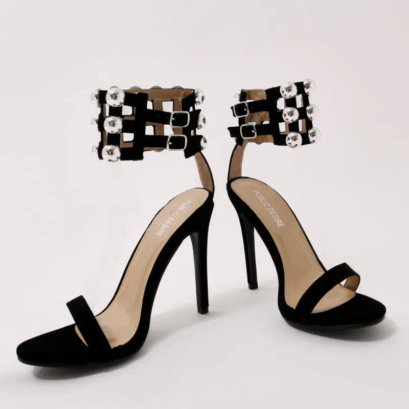 Edge Dome Stud Caged Cuff Stiletto Heels in Black Faux Suede sold by Public Desire