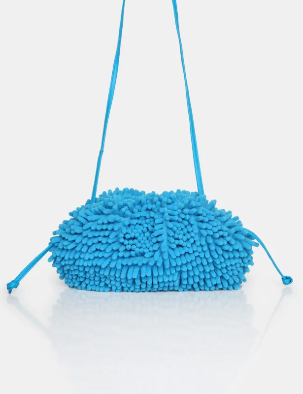 The Ausha Blue Chenille Clutch Bag sold by Public Desire