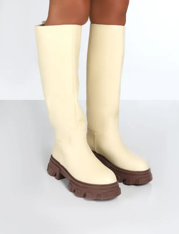 Elena Butter Knee High Chunky Sole Boots sold by Public Desire