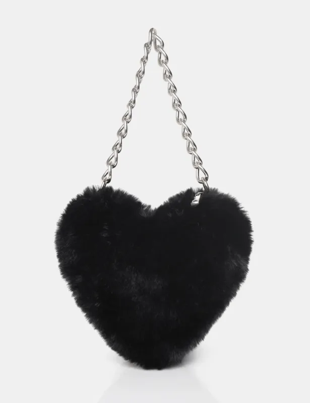 The Anouk Black Heart Shaped Faux Fur Grab Bag sold by Public Desire
