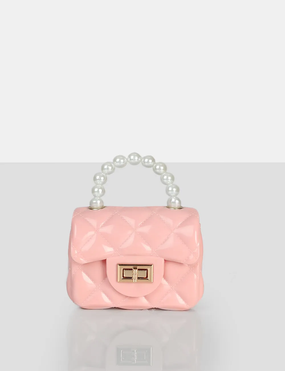 The Iddy Pink Patent Pearl Mini Bag sold by Public Desire