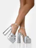 Magnum Silver Pu Knot Strap Platform Diamante Block Heels sold by Public Desire
