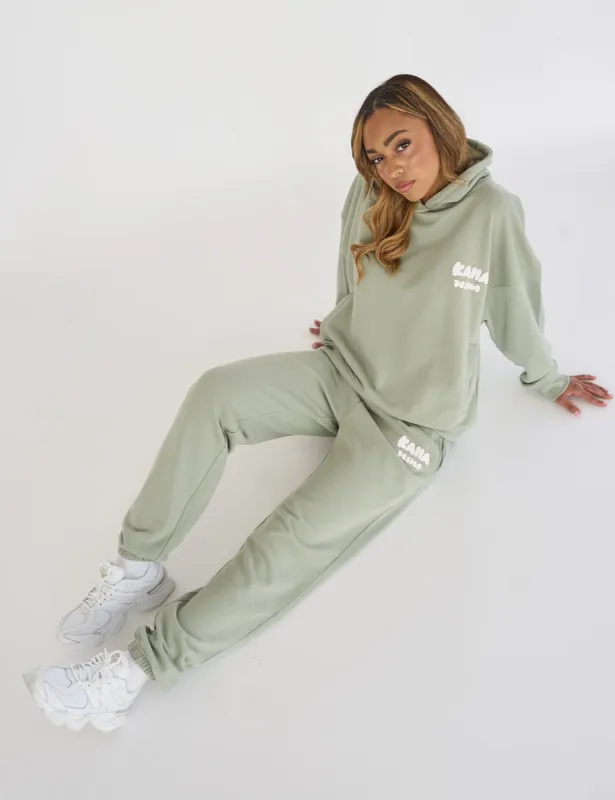 Kaiia Design Bubble Logo Cuffed Joggers Sage Green sold by Public Desire