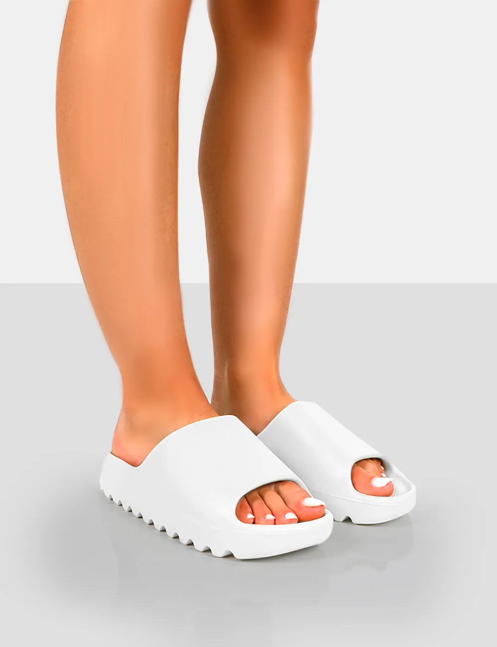 Brady White Rubber Flat Slider Sandals sold by Public Desire