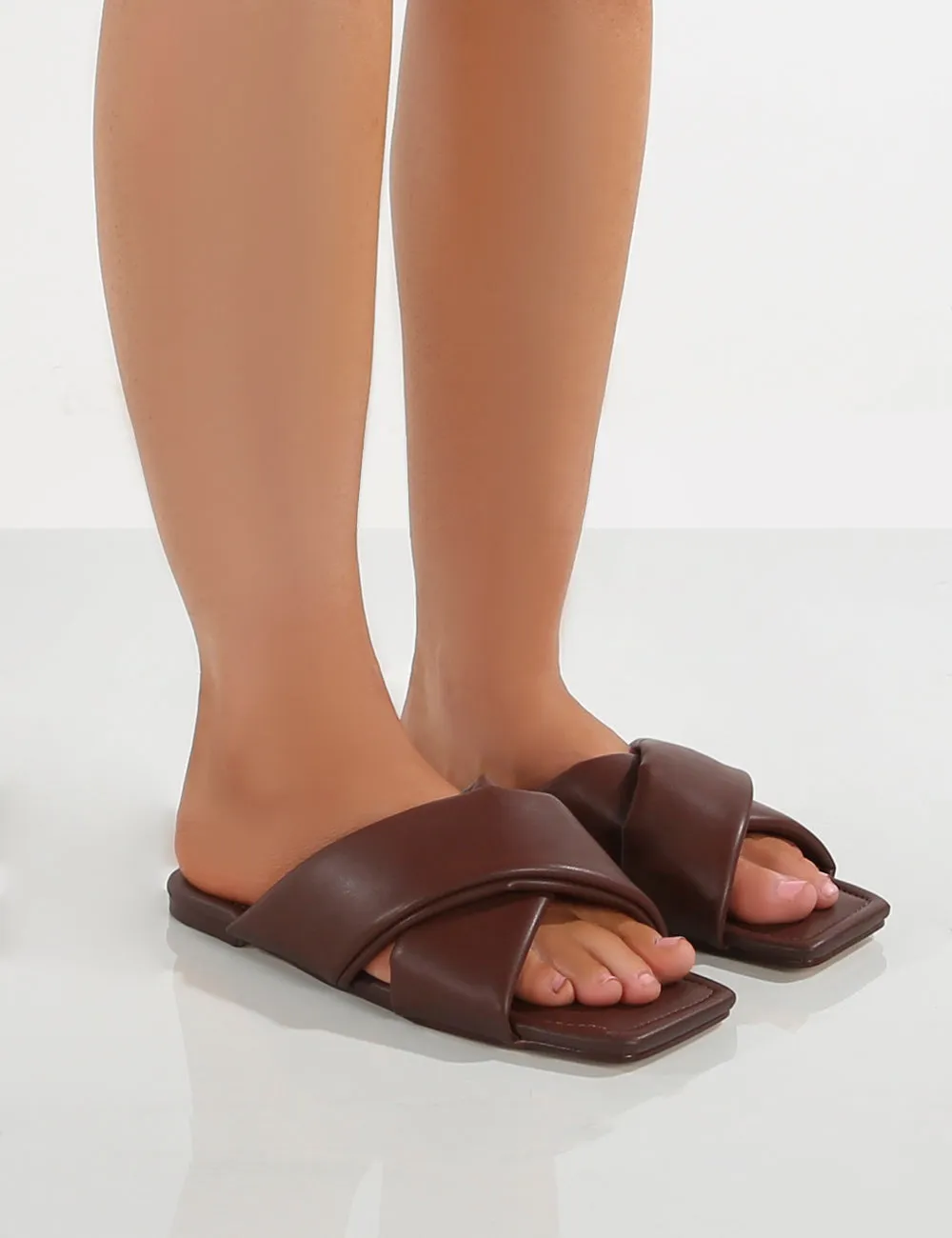 Tropicana Choc PU Cross Over Slider Sandals sold by Public Desire