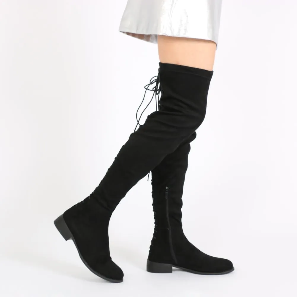 Arya Lace Up Back Flat Long Boots in Black Faux Suede sold by Public Desire