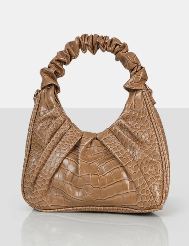 The Taci Tan Shoulder Mini Bag sold by Public Desire