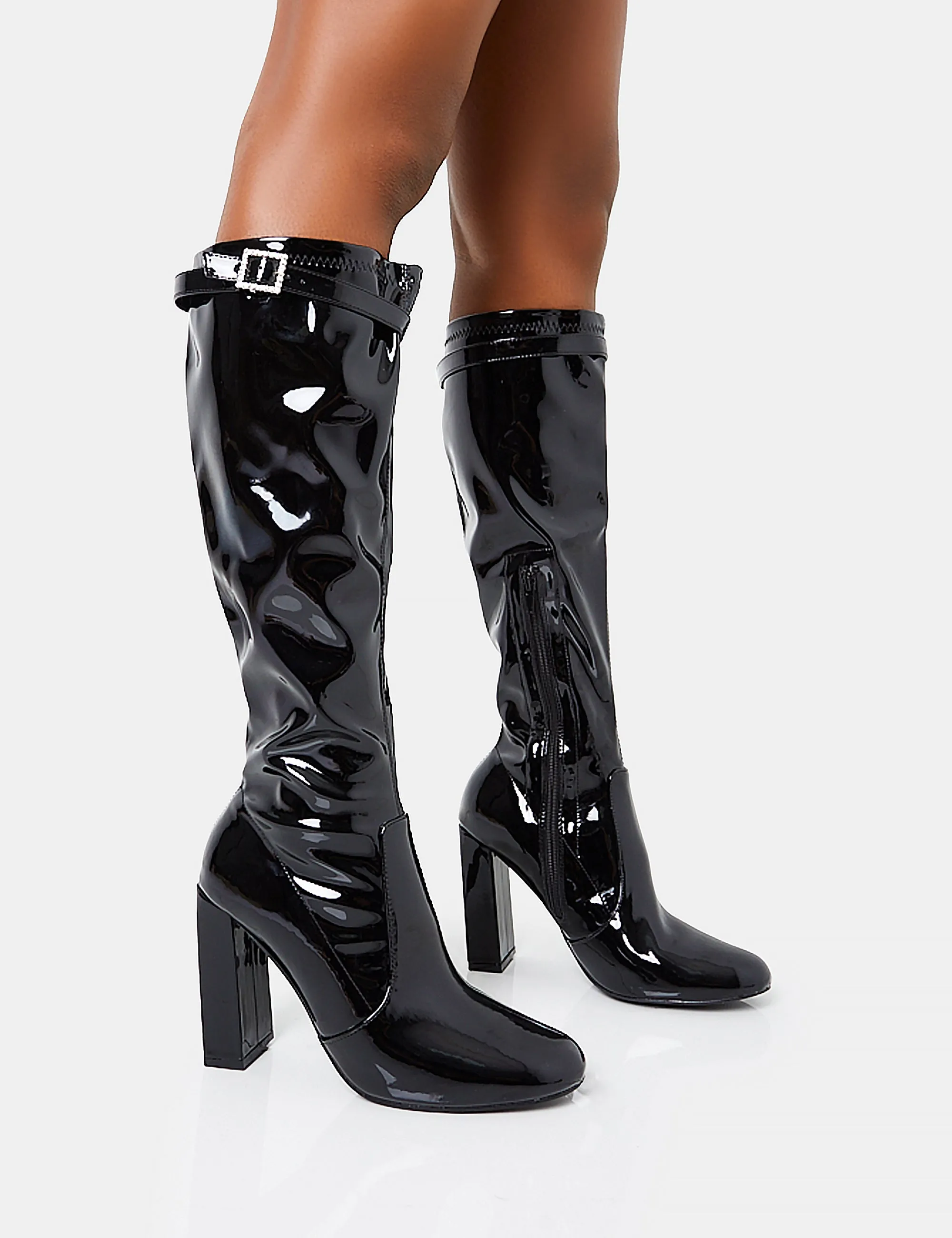 First Class Black Buckle Strap Detail Knee High Block Heeled Boots sold by Public Desire