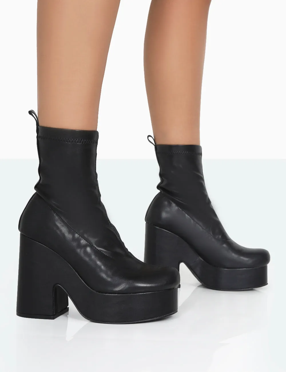 Trix Black Stretch PU Platform Ankle Boots sold by Public Desire