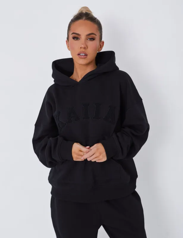 Kaiia Slogan Oversized Hoodie Black on Black sold by Public Desire