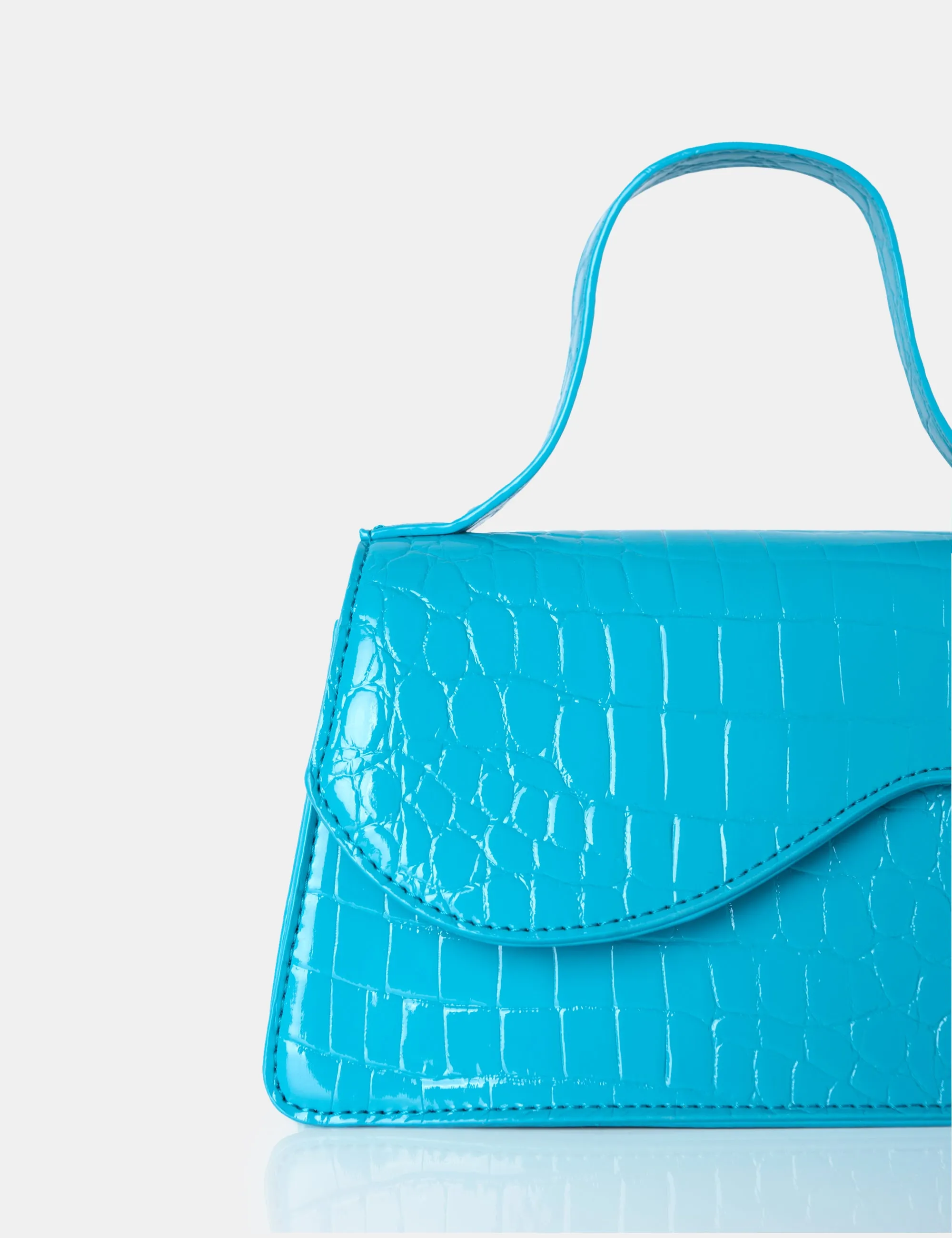 The Polly Blue Croc Top Handle Mini Bag sold by Public Desire product image thumbnail 2
