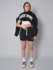 Kaiia Sport Slogan Oversized Hoodie Black With White sold by Public Desire