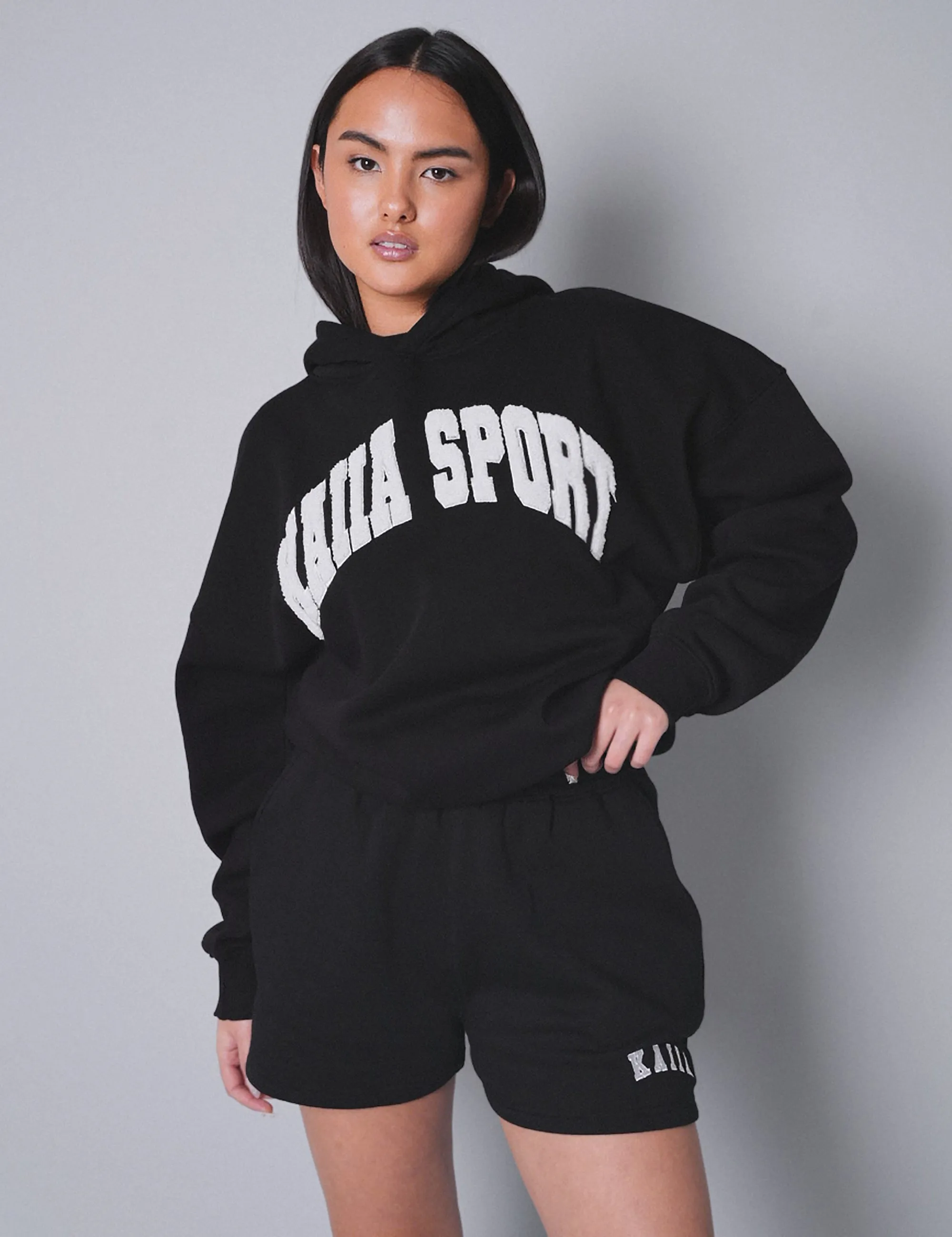 Kaiia Sport Slogan Oversized Hoodie Black With White sold by Public Desire