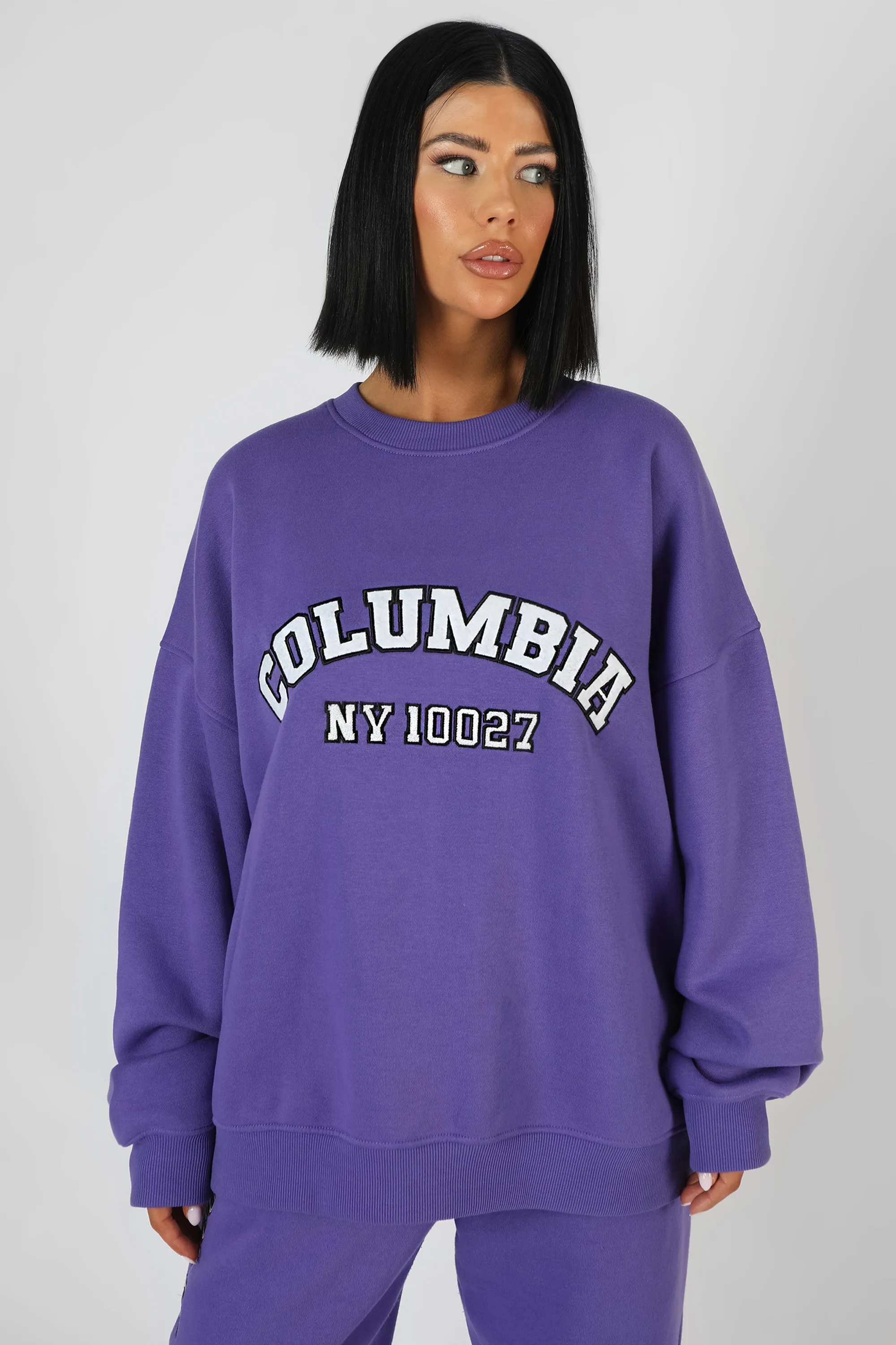 Oversized Columbia Slogan Sweatshirt Purple sold by Public Desire product image thumbnail 2