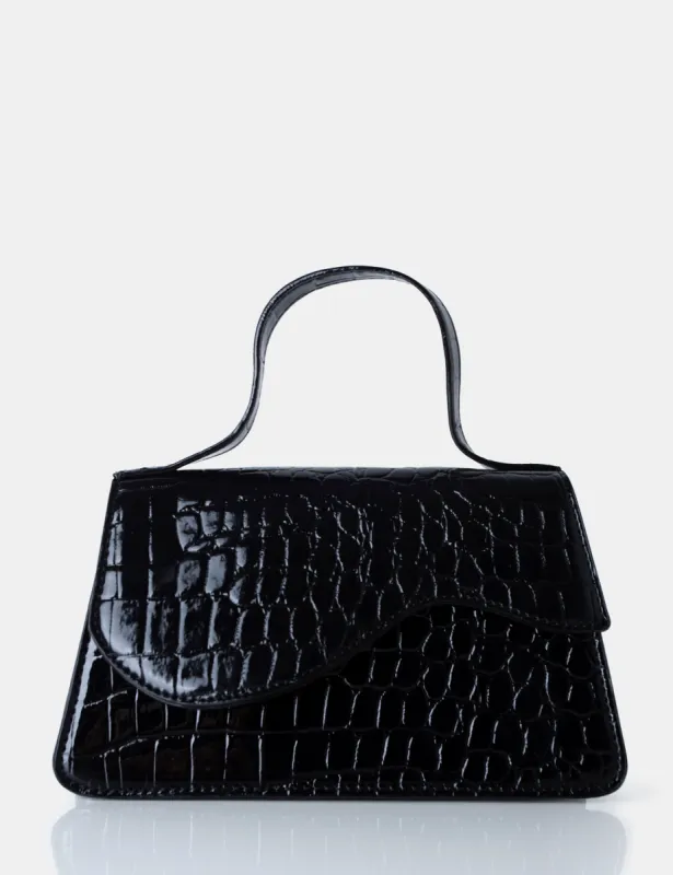 The Polly Black Croc Top Handle Mini Bag sold by Public Desire