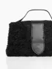 The Mika Black Shearling Mini Bag sold by Public Desire