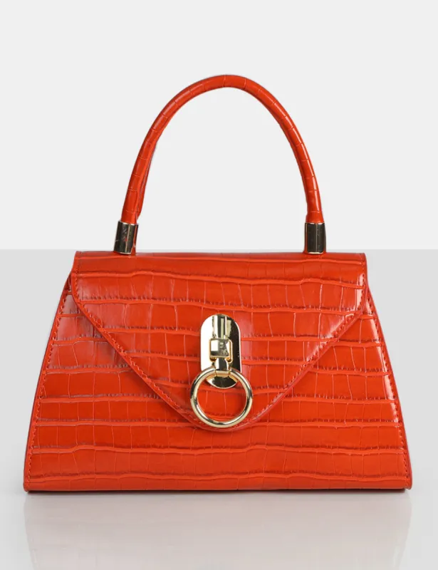 The Nia Orange Croc Pu Mini Handbag sold by Public Desire