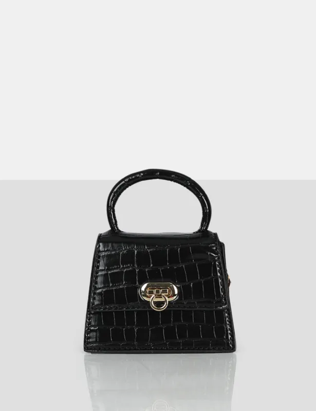 The Lilly Black Textured Mini Bag sold by Public Desire
