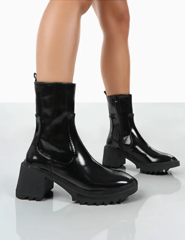 Sway Black PU Heeled Wellies Platform Chunky Sole Block Ankle Boots sold by Public Desire