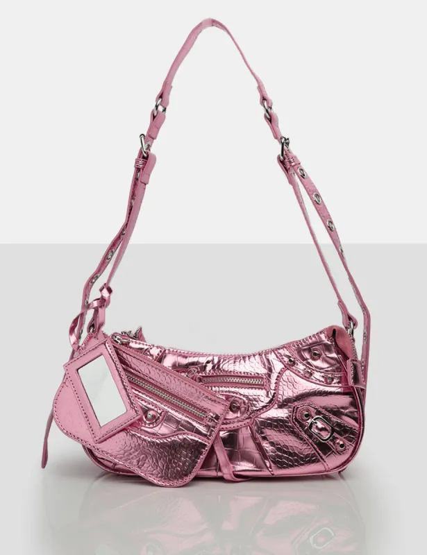 The Trackstar Metallic Pink Pu Studded Mirror Zip Detail Handbag sold by Public Desire