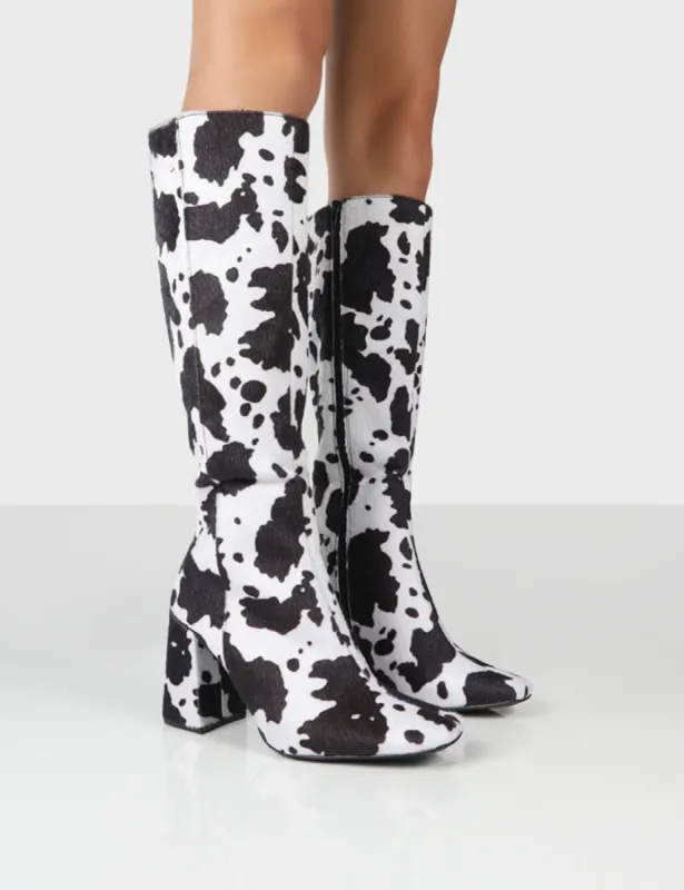 Apology Mono Cow Print Knee High Block Heel Boots sold by Public Desire