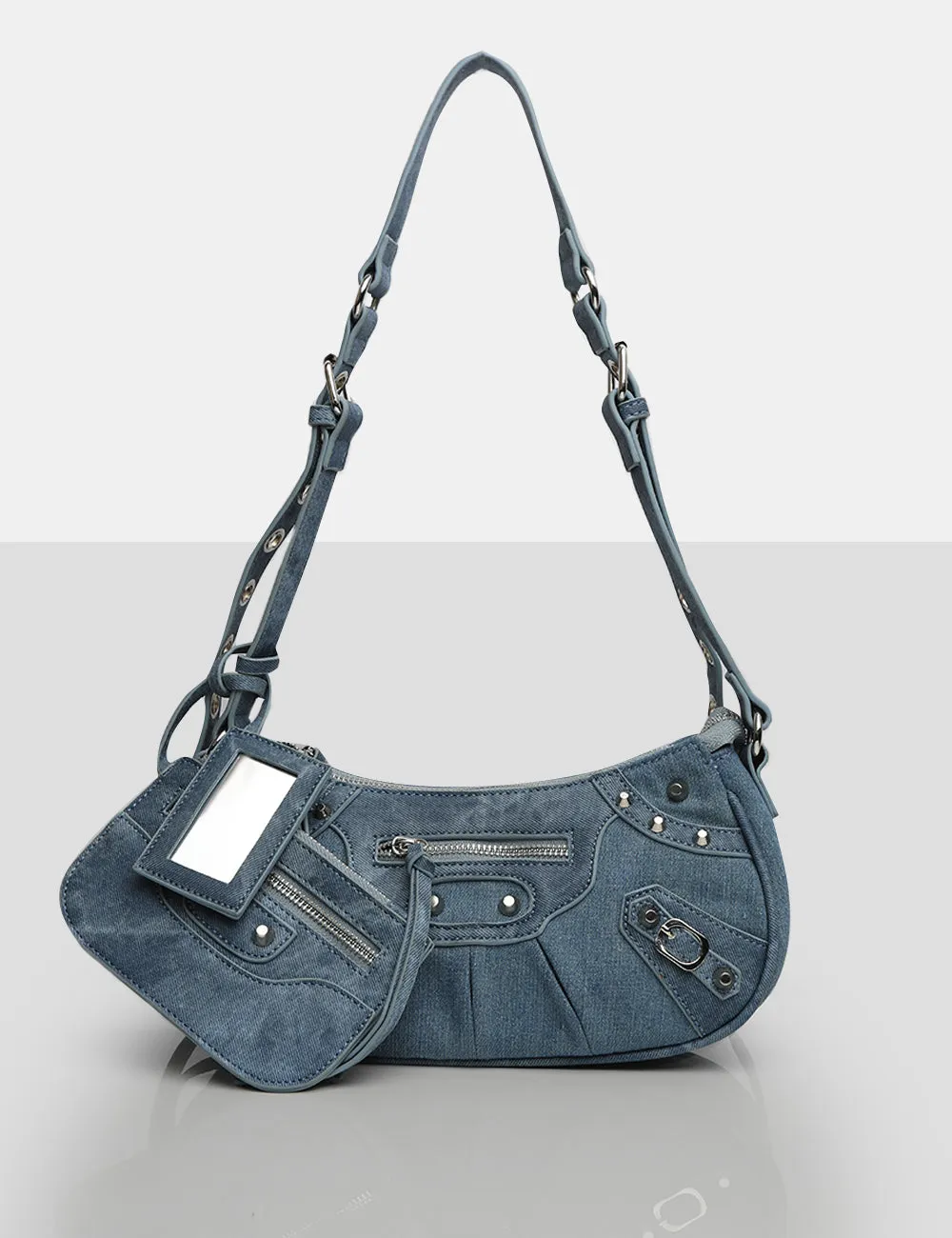 The Trackstar Denim Pu Studded Mirror Zip Detail Handbag sold by Public Desire