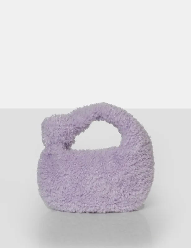 The Lyra Lilac Fluffy Mini Handbag sold by Public Desire