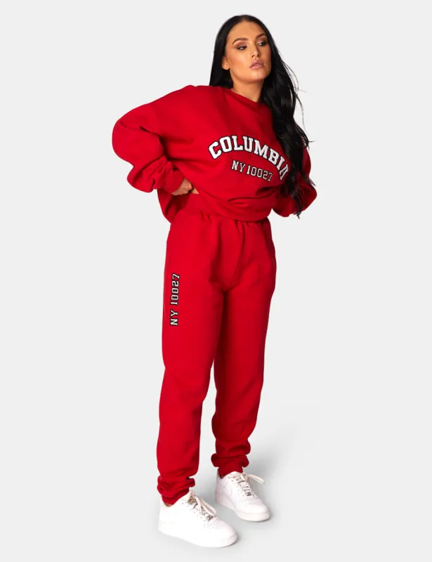 Oversized Columbia Embroidered Slogan 90S Joggers Red sold by Public Desire