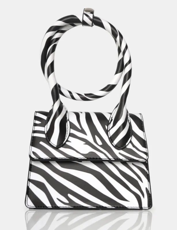 The Milan Zebra Print Monochrome Pu Crossbody Mini Bag sold by Public Desire