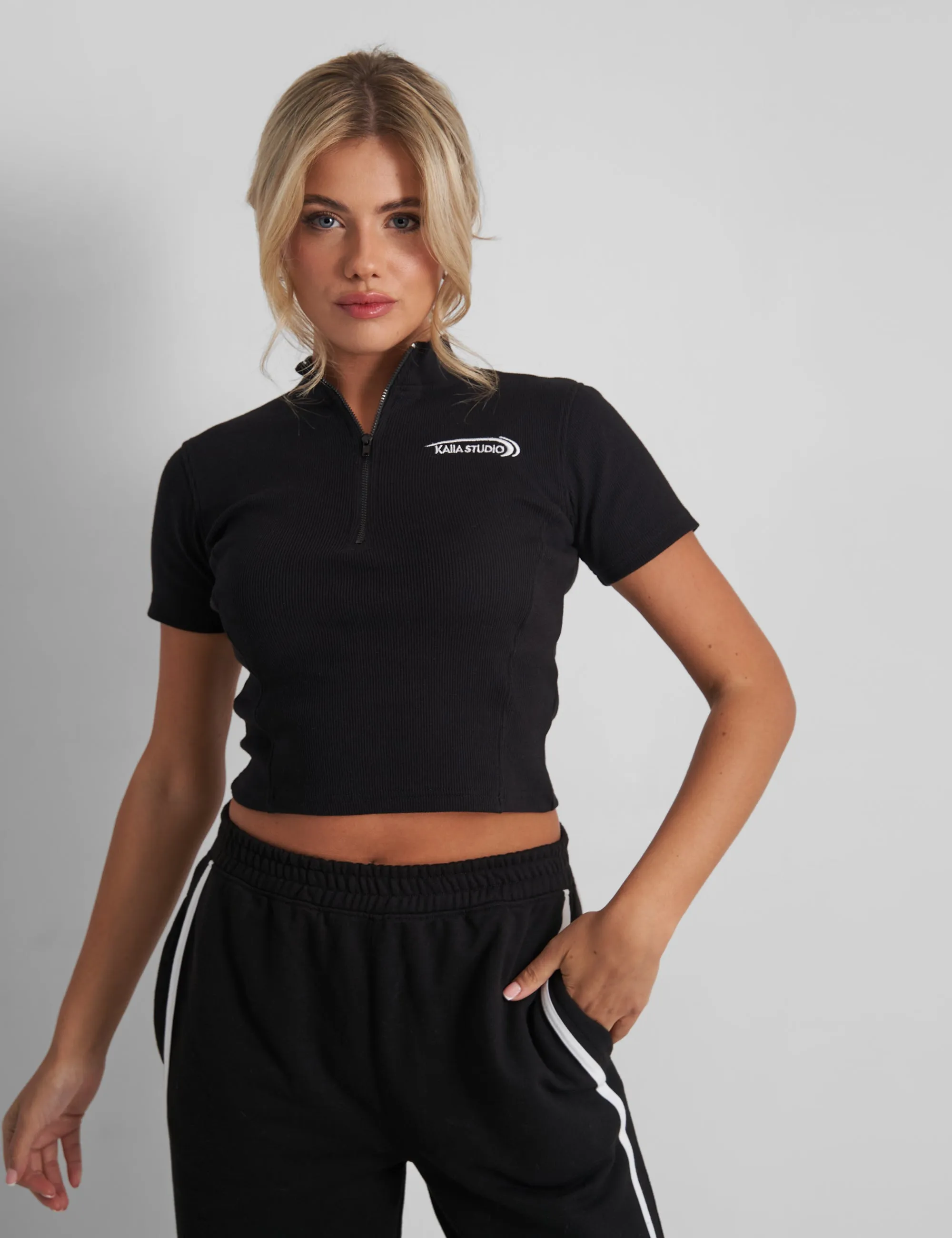 Kaiia Studio Zip Up Logo Crop Top Black sold by Public Desire