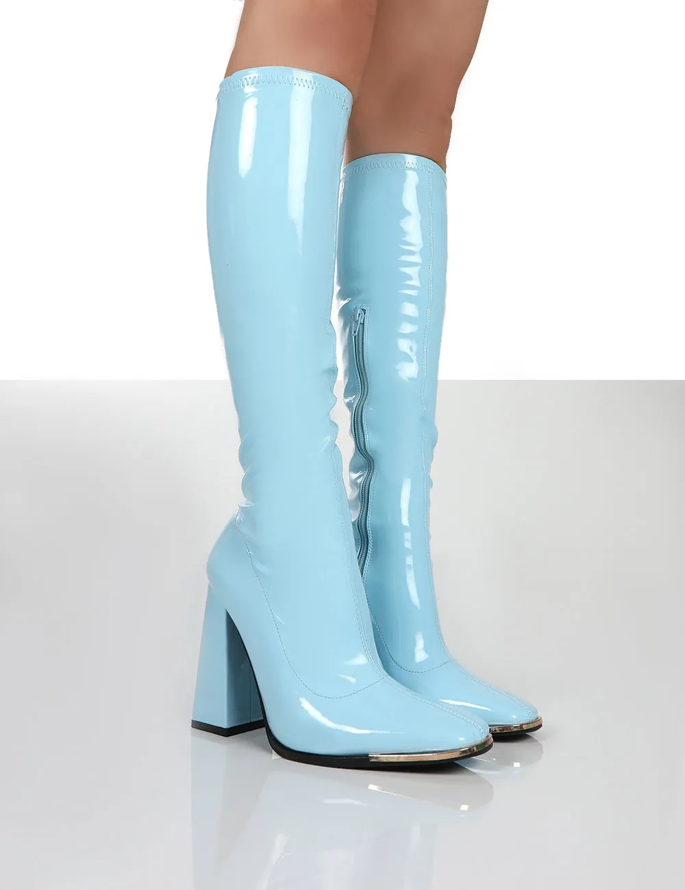 Caryn Blue Patent Knee High Block Heeled Boots sold by Public Desire